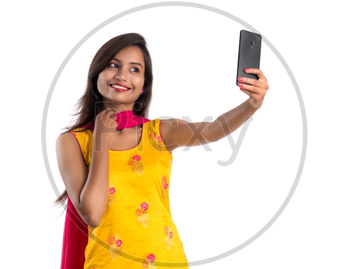 Beautiful Indian Girl Taking Selfie In Smart Phone
