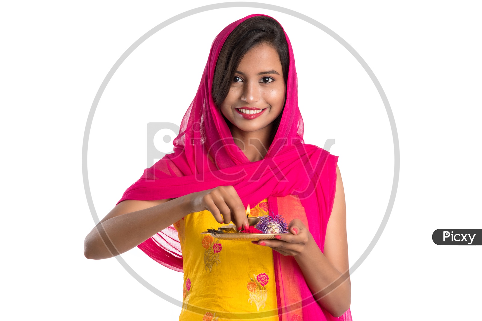 Beautiful Indian Girl Holding Pooja Thali Or Pooja Plate  In Hand
