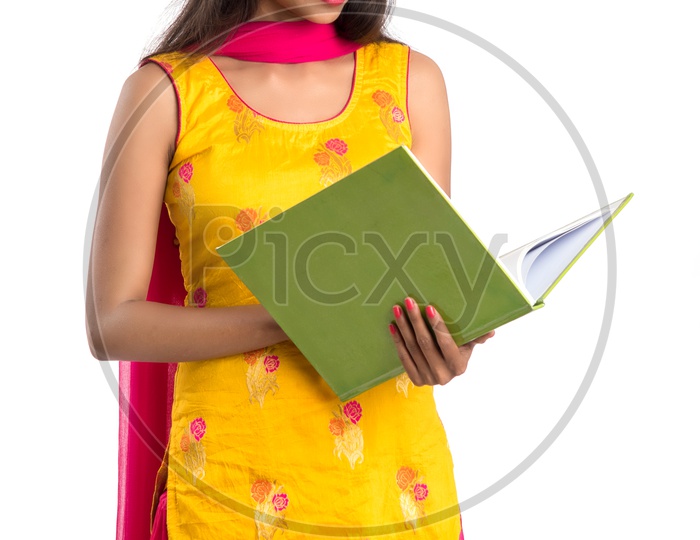 Beautiful Indian College Girl With a Open Book In Hand