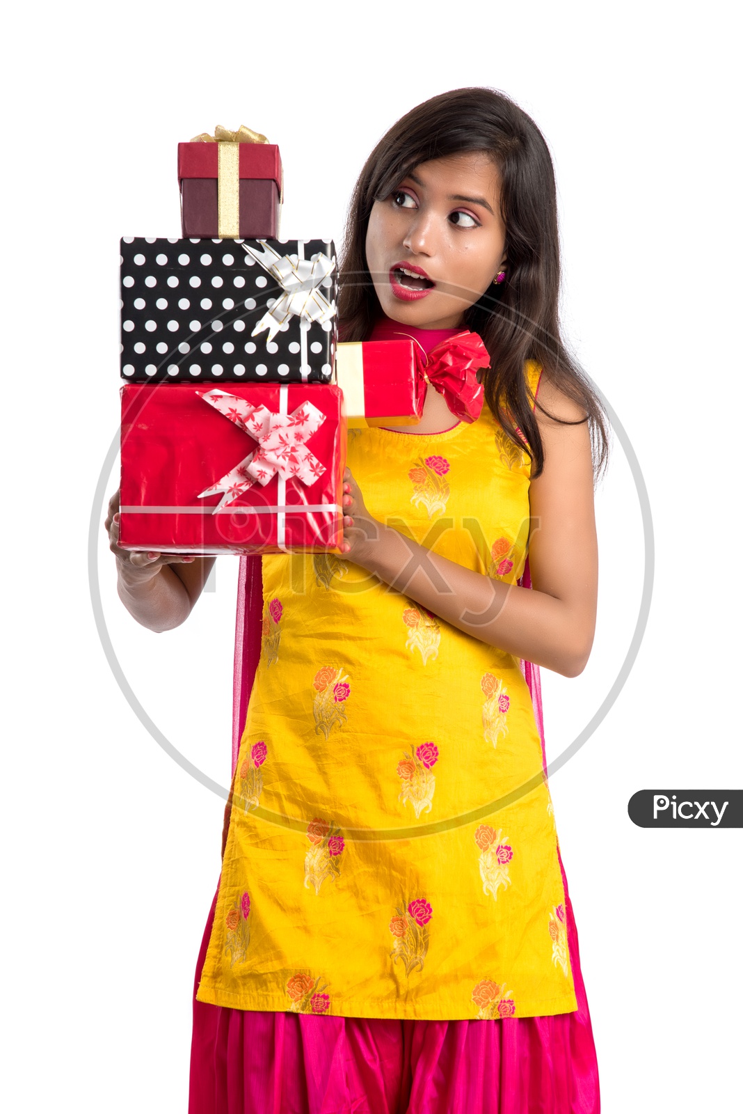 Beautiful Indian Girl With Gift Boxes In Hand with a Smile Face