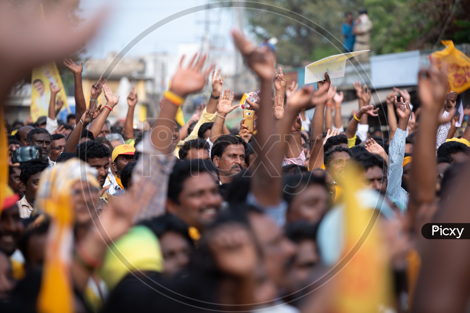 TDP Party  Supporters  Hands Rise During Election Campaign Rally