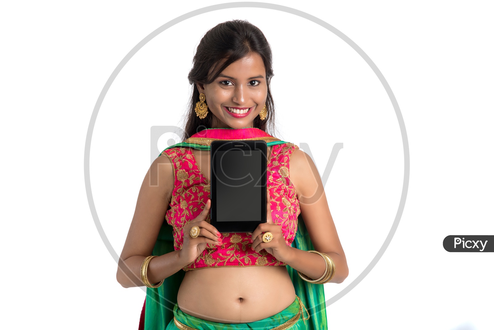 Portrait Of a beautiful Traditional Indian Woman Showing  a Smart Phone Screen  And  With a Smile Face