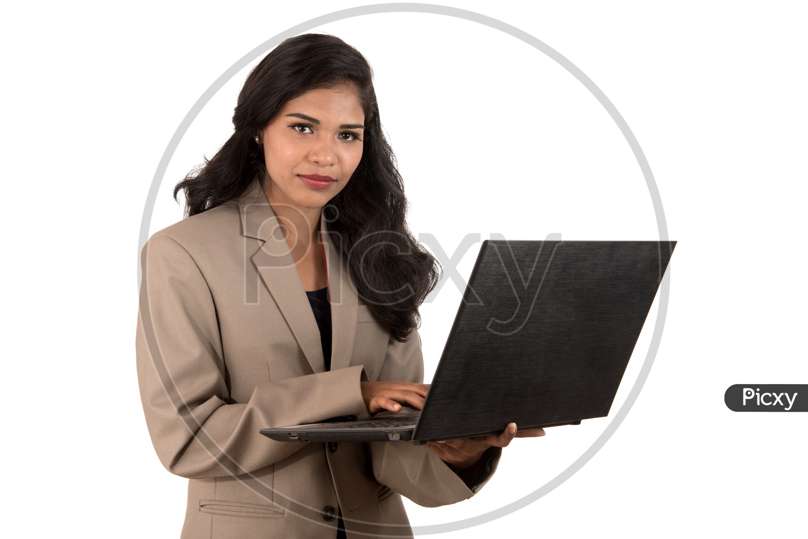 Young Indian business woman using a laptop