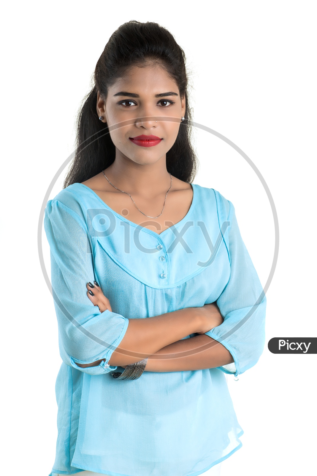 Portrait Of a Young Indian Girl With a Smile Face and Posing On an Isolated White Background