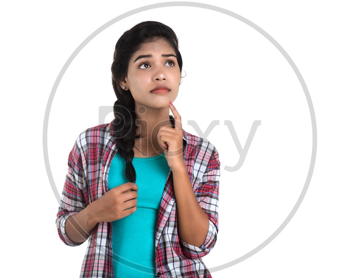 Young Indian Girl Thoughtfully Thinking With an Expression on Her Face On white Background