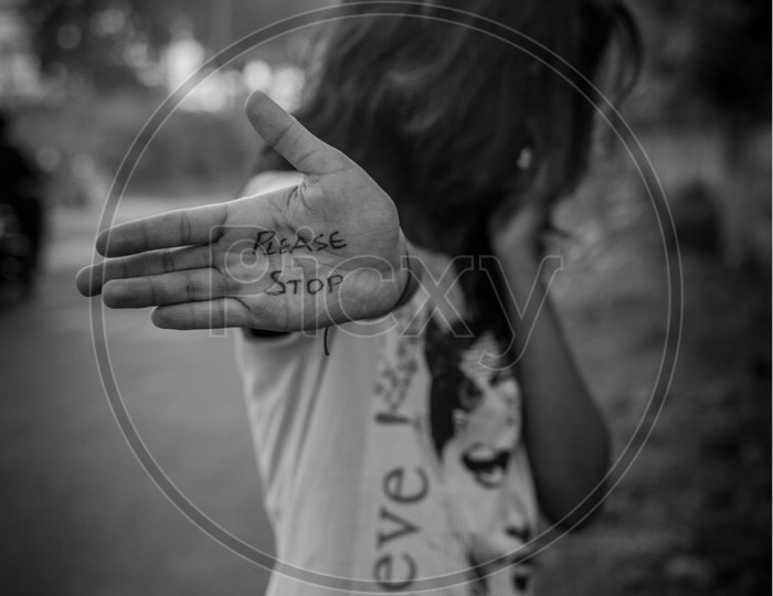 Girl With Please Stop Writing On Her Hand