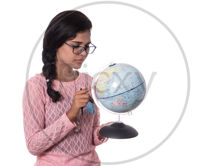 Young Indian Girl Holding A World Globe on White Background