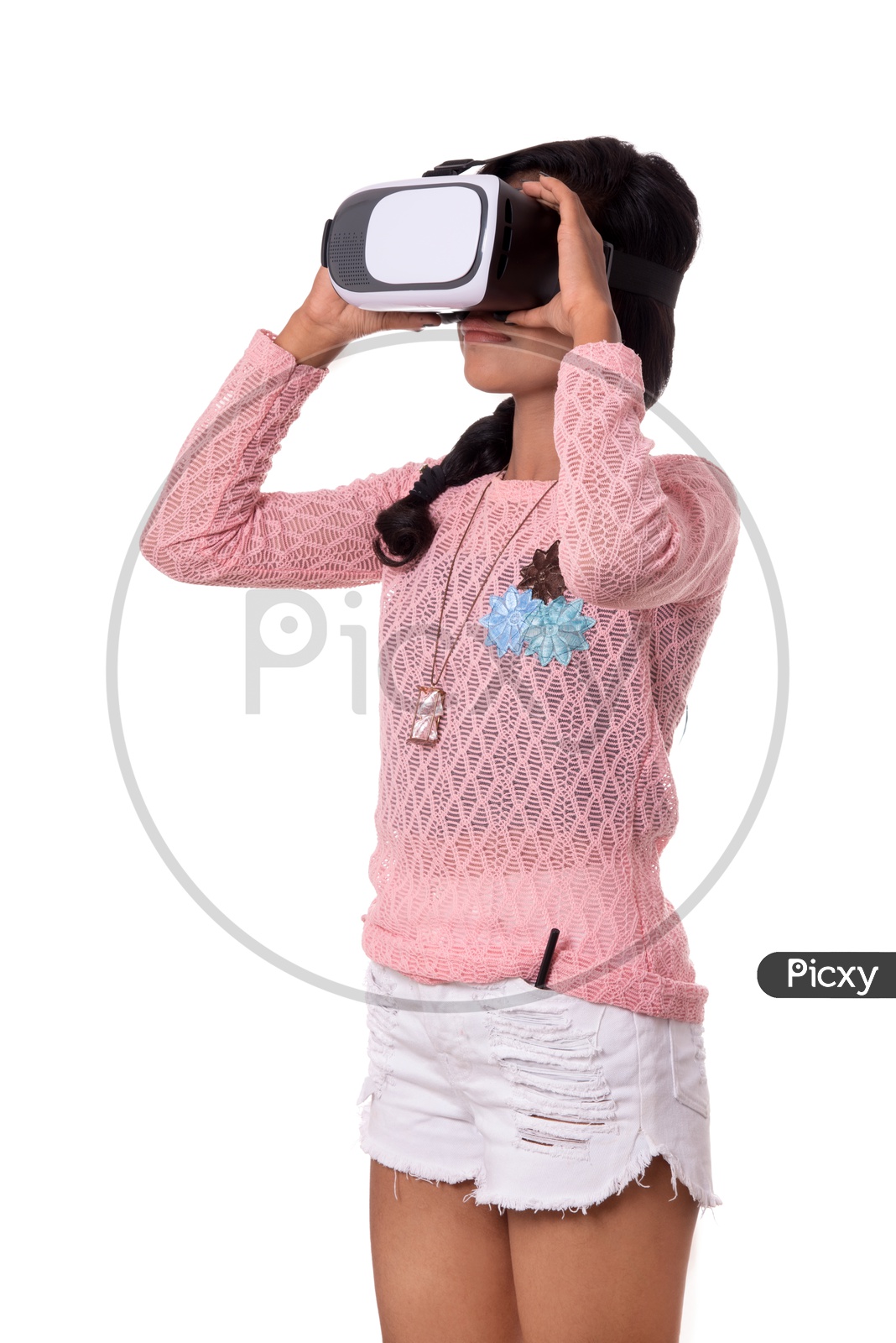 Young Girl Looking Through VR Device , Indian Girl Experiencing The Virtual Reality Headset