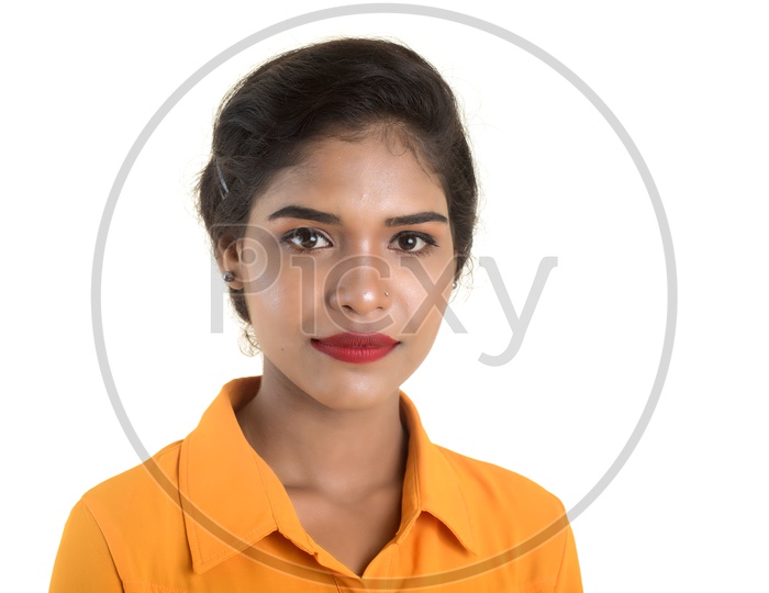 Portrait of beautiful Indian woman wearing orange shirt