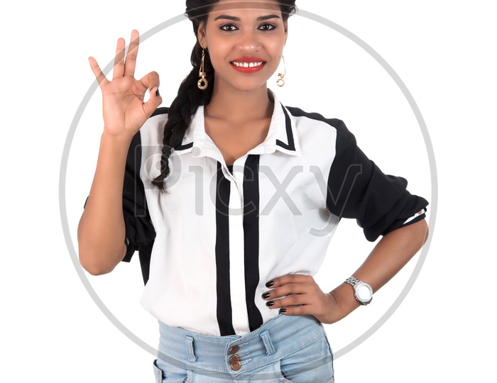 Young Beautiful Girl Standing With a Gesture and expression And Posing Over Isolated White Background