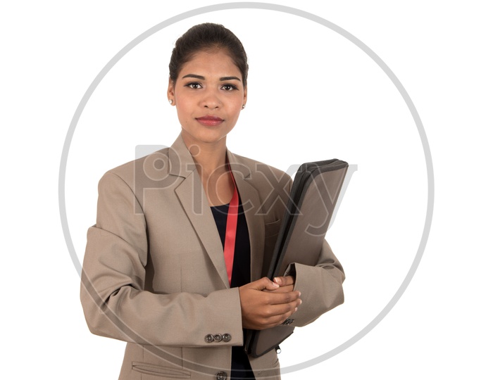 Young Indian business woman holding folder