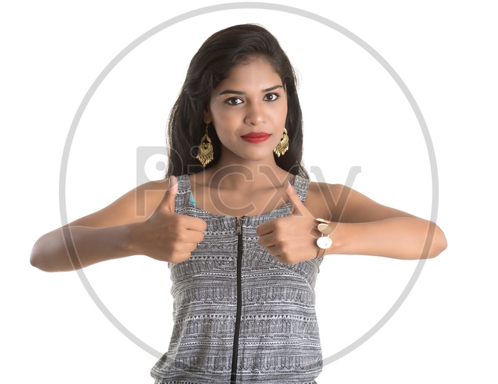Indian woman giving a thumbs up