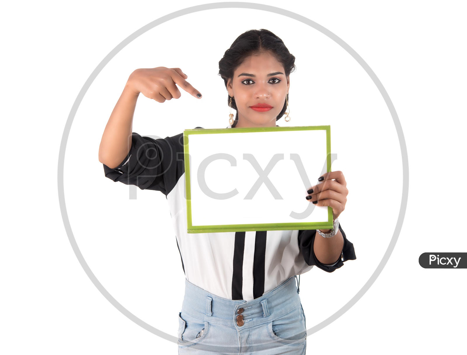 Pretty Young Indian girl Holding Blank Placard and Pointing Empty Space On an White Background