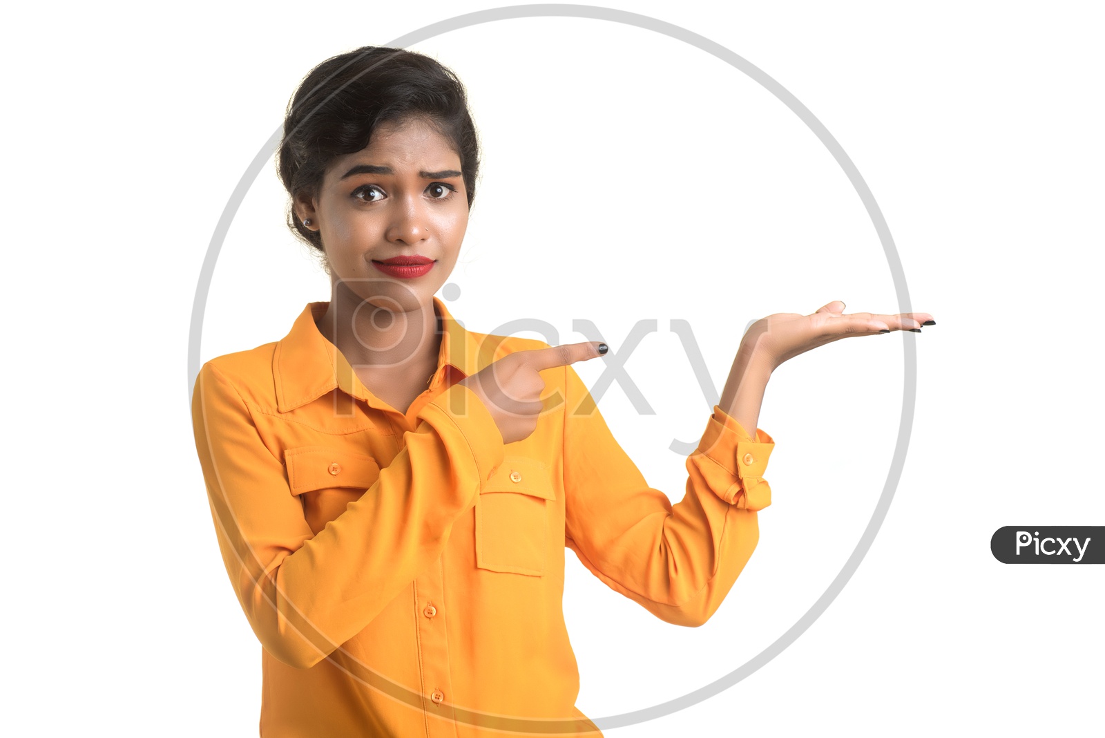 Young Pretty Girl Showing Space With an Expression on Face  on an Isolated White Background