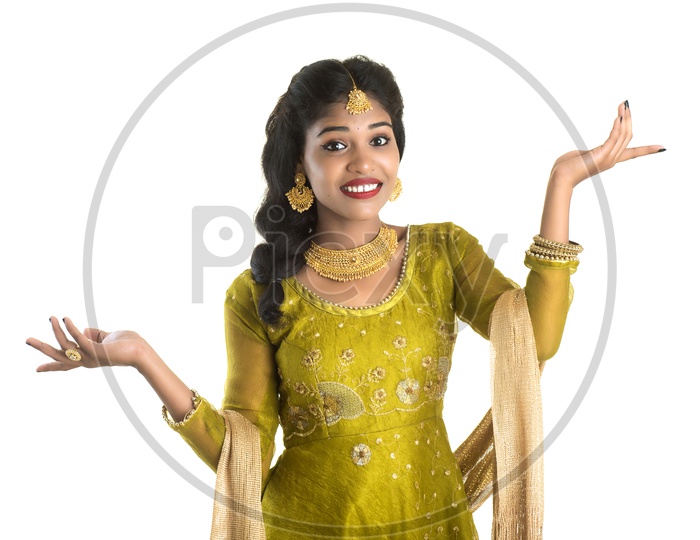 Portrait Of a Beautiful Young woman In Elegant Look  with gestures and expression and Posing Over White Background