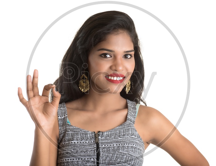 Portrait Of a Pretty Young Girl With Gestures And Expression On Face Posing On an Isolated White Background