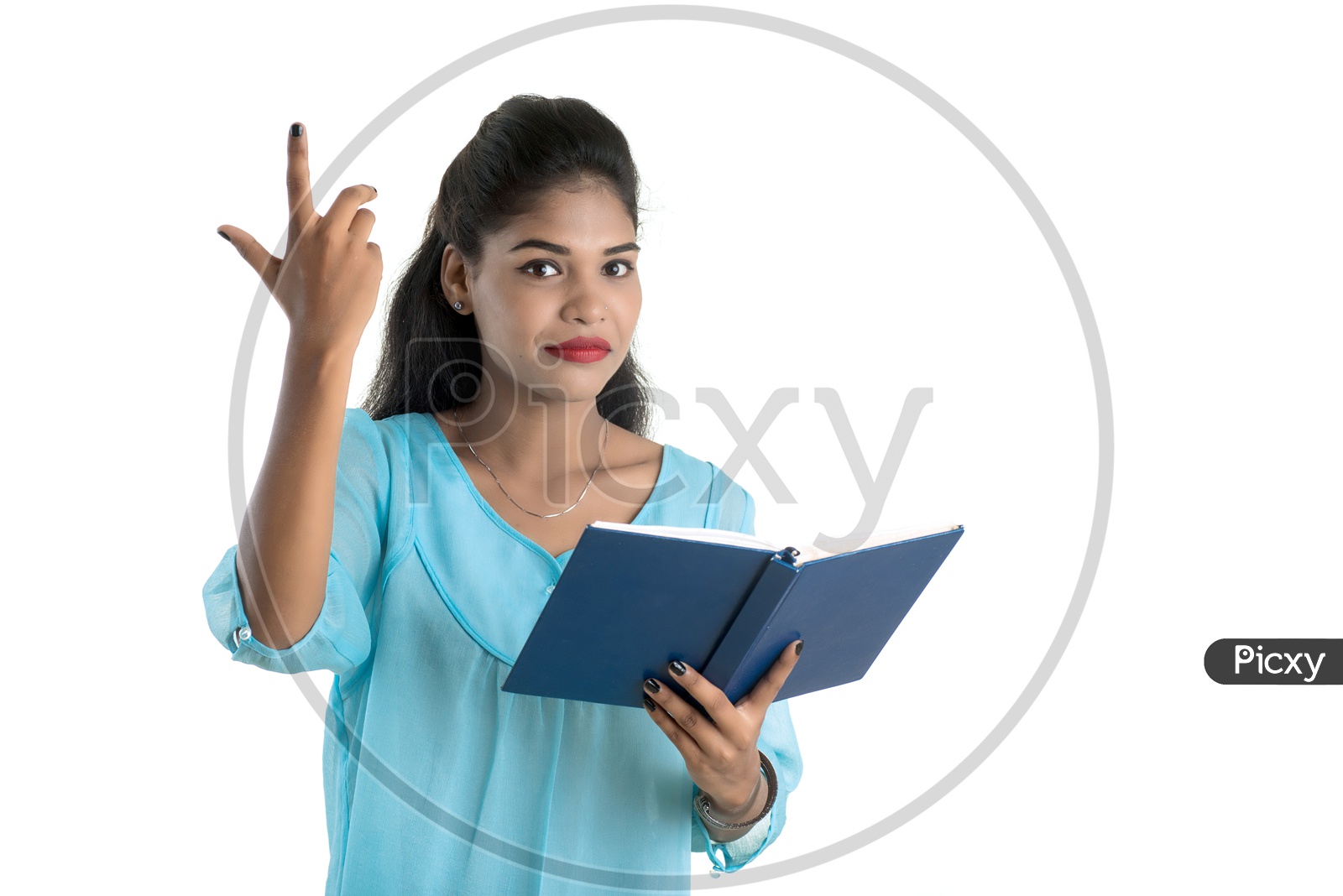 Pretty Young Girl Student Holding Book with Expression on her Face  and  Posing on an isolated White Background