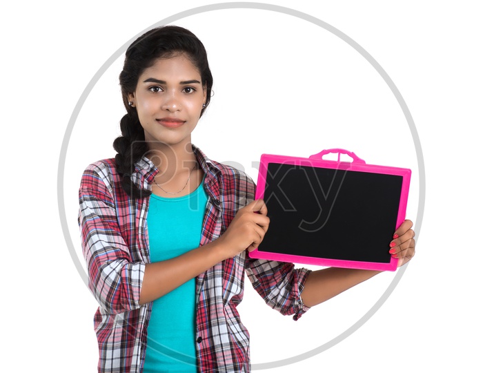Young Indian Woman Holding Blank Slate Board and Showing The Empty Space On White Background