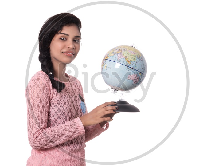 Young Indian Girl Holding a World Globe On White Background