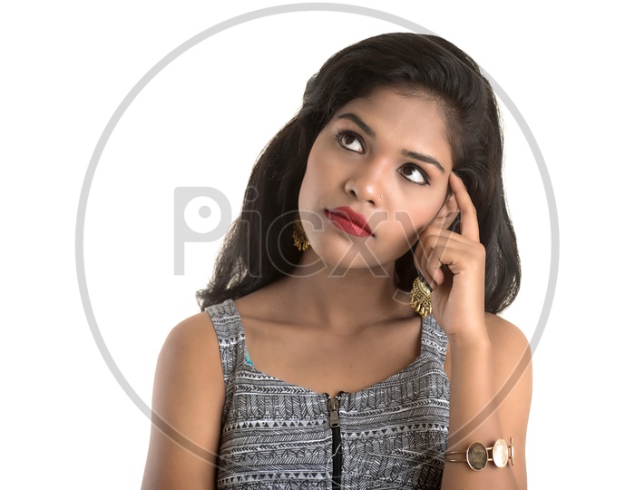 Pretty Young Girl Posing With an Expression  On an Isolated White Background