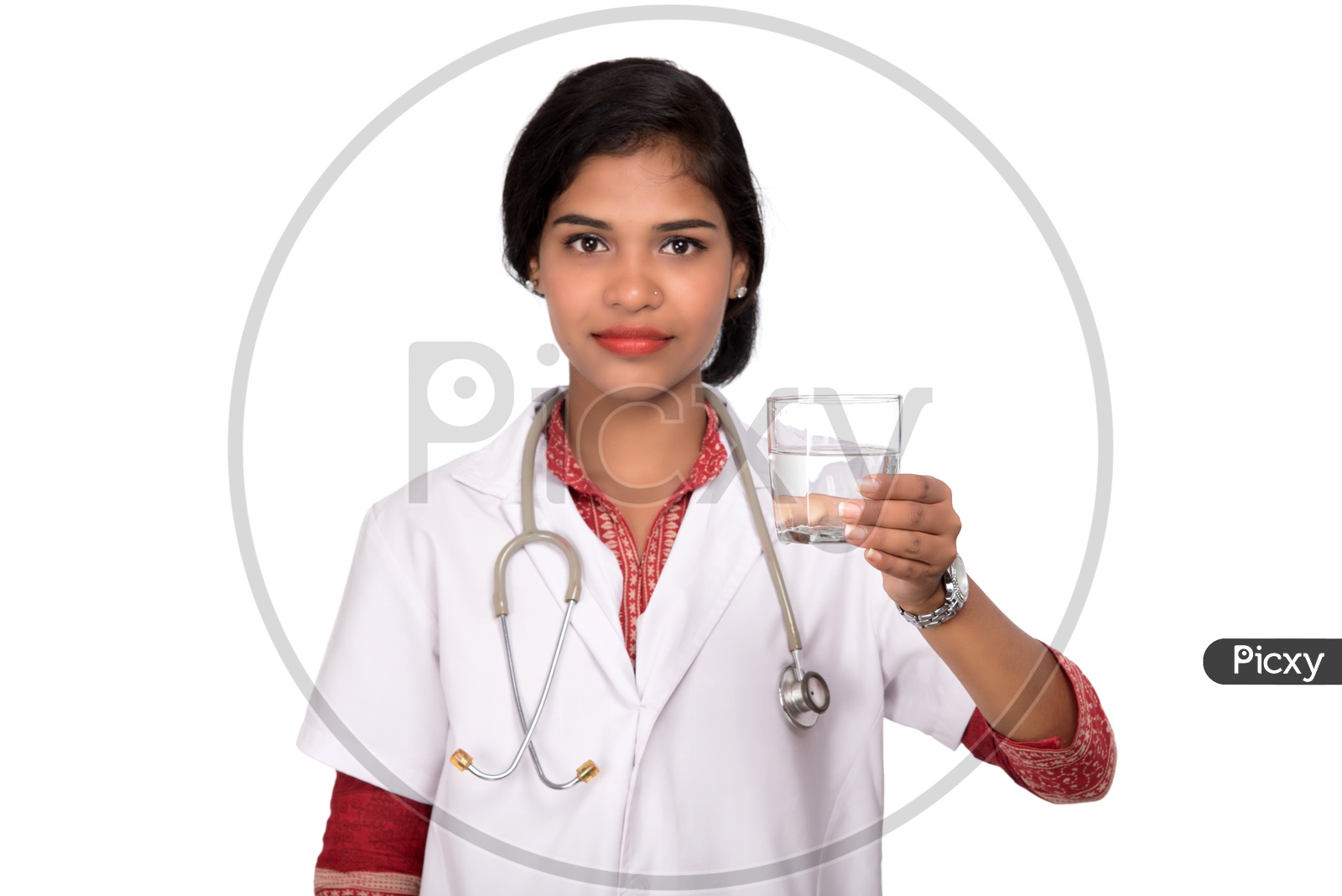 Indian Female Doctor holding a glass of water