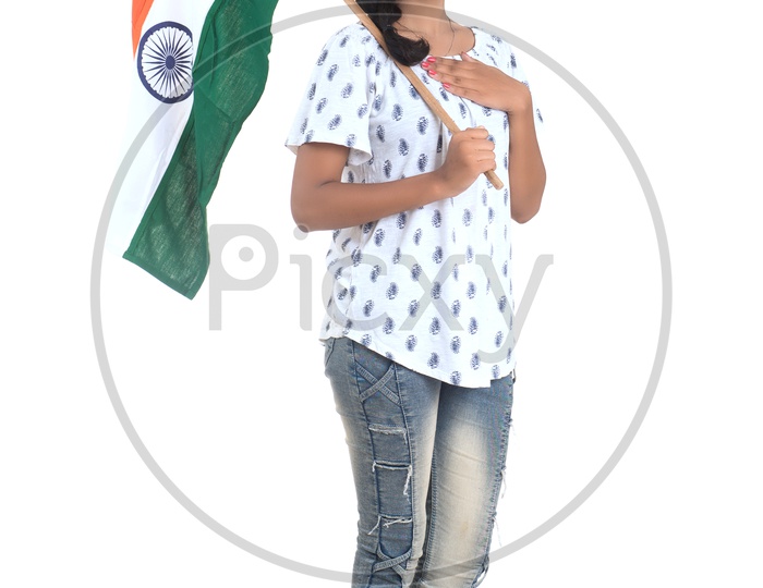 Girl Holding Indian National Flag or tricolour Flag In hand and Standing And Posing On a White Background