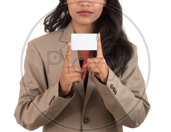 Smiling business woman holding a blank business card or ID card over white background