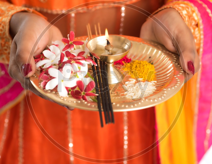 Indian Hindu Pooja Plates Or Pooja Thali Closeup With Fragrance Sticks , Dia , Flowers , Turmeric And  Kumkum