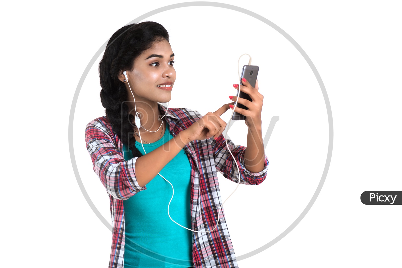 A Pretty Indian Young Girl Making Video Call on her Smart Phone With an Expression on an isolated White Background