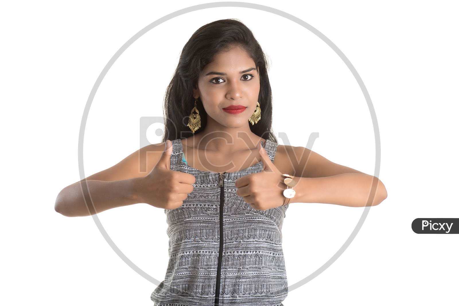 Indian woman giving a thumbs up