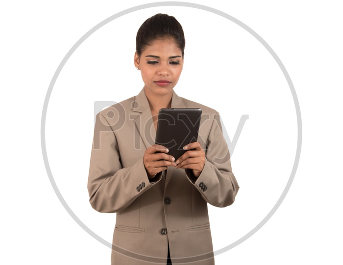 Indian business woman using a tablet smartphone