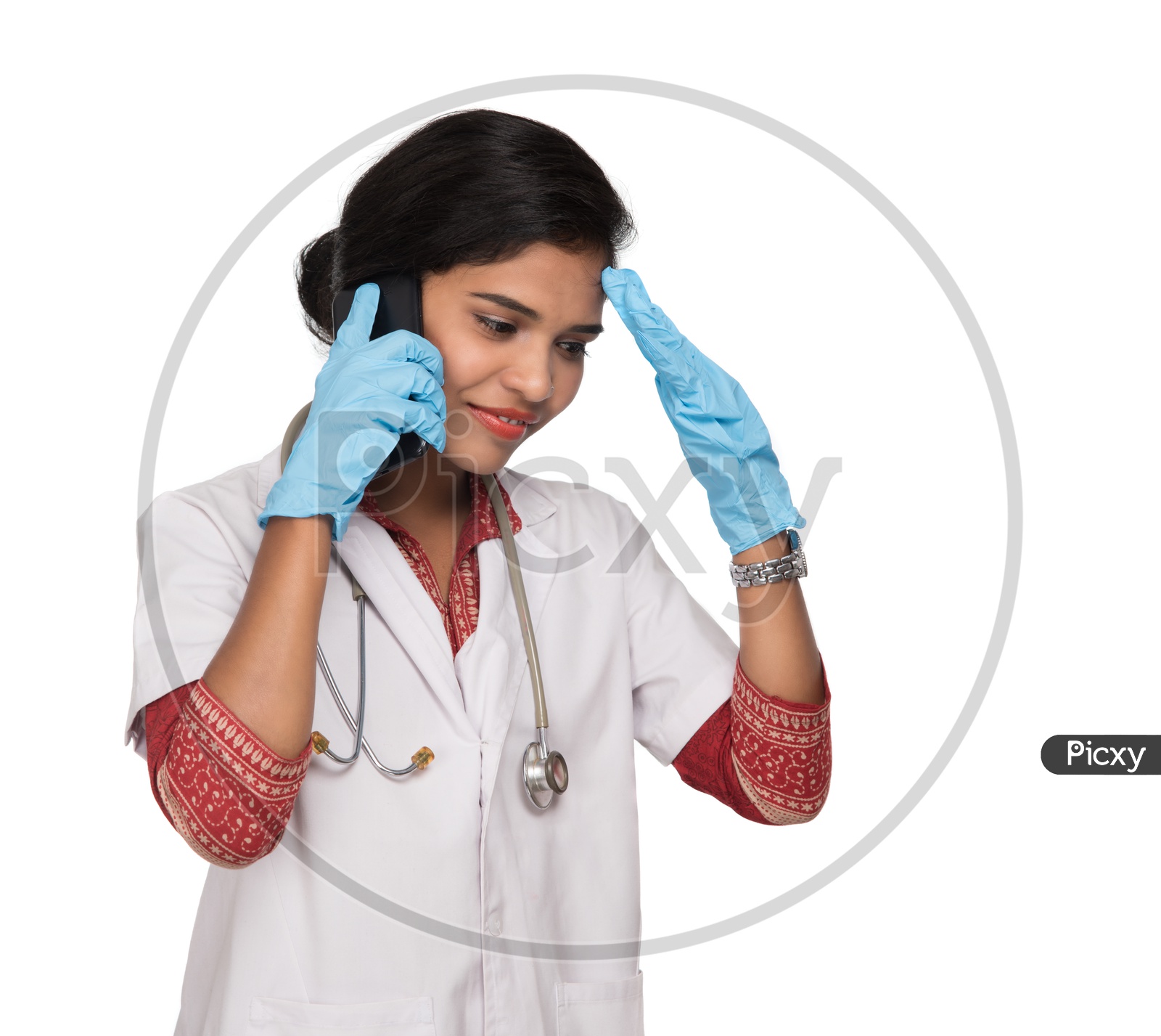 Indian Female Doctor talking over the phone