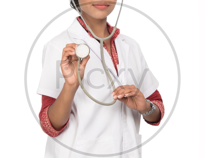 Young Lady Doctor With Stethoscope in Hand On an Isolated White Background