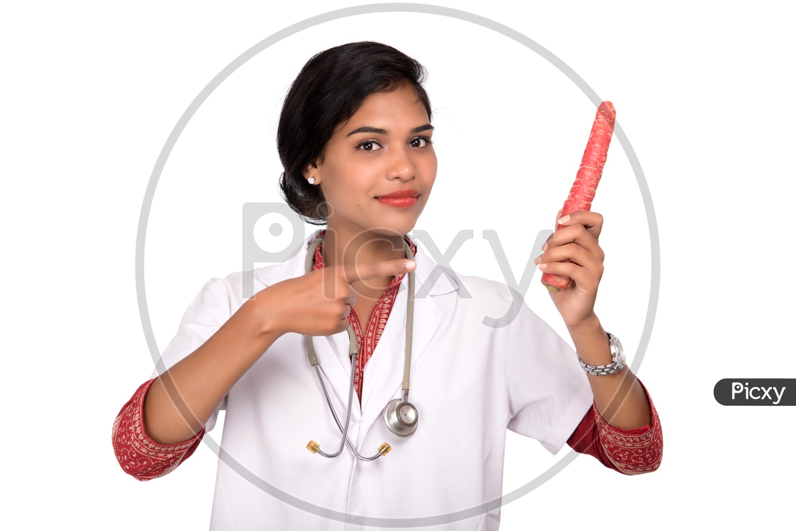Indian Female Doctor holding carrot