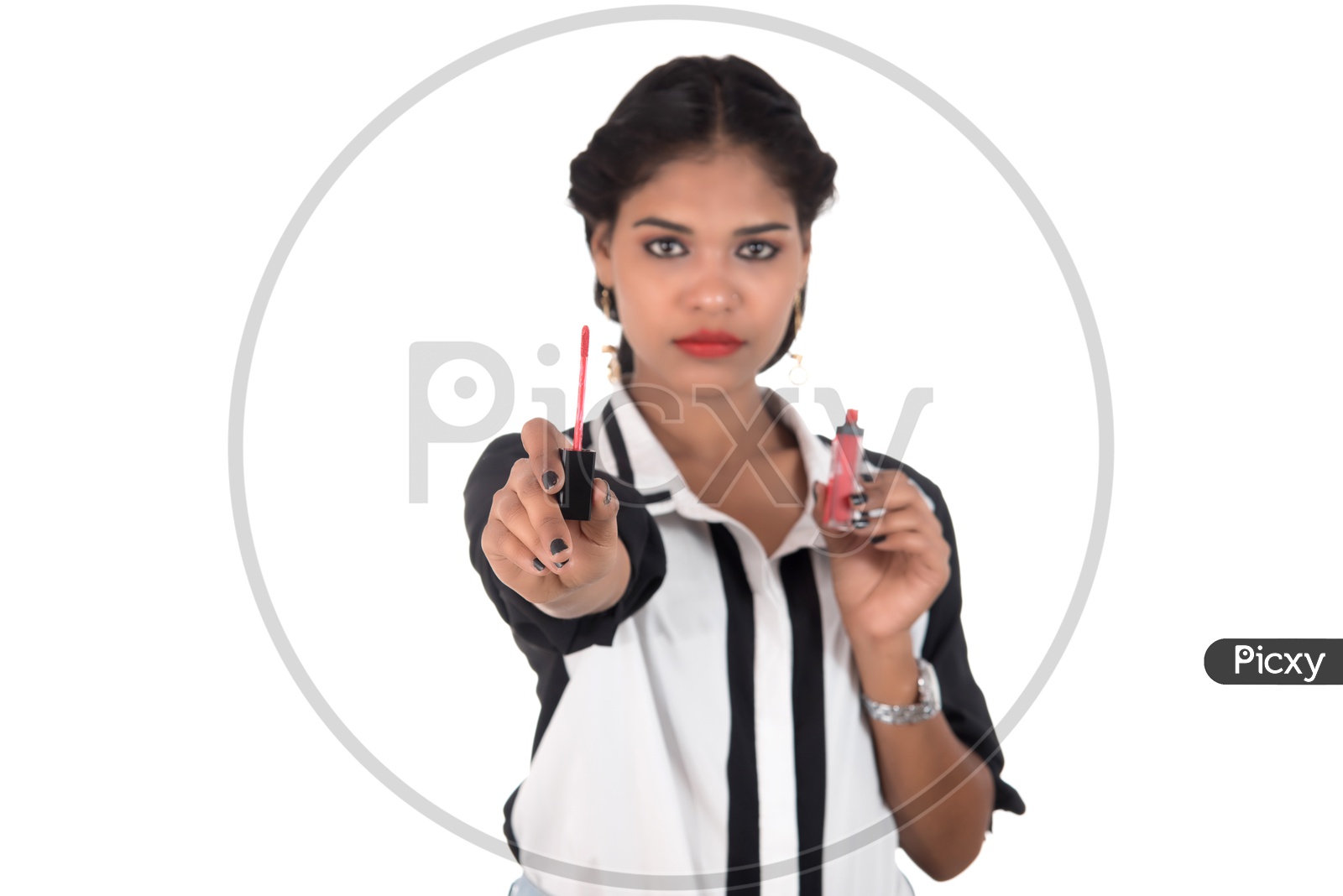 Young Indian Girl Showing Lipstick And Posing on an Isolated White Background