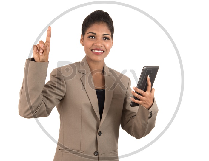 Indian business woman using a tablet phone