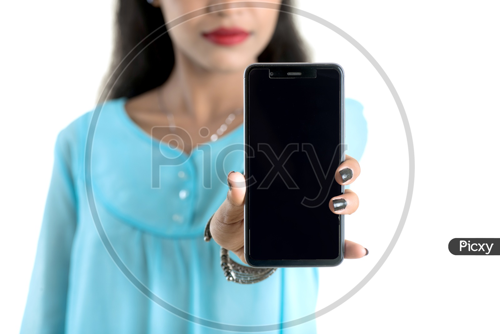 Young Indian Girl Showing  the Blank Mobile Screen and Pointing The Space On an Isolated White Background