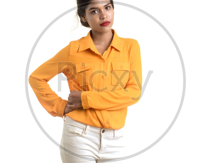 Portrait Of a Young Indian Girl Posing On an Isolated White Background