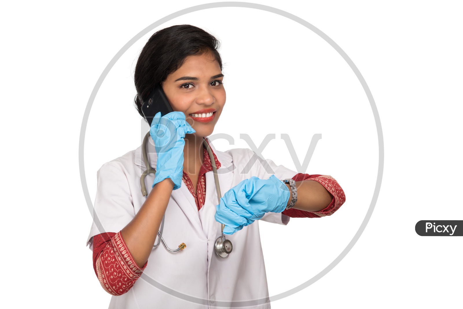 Indian Female Doctor talking over the phone