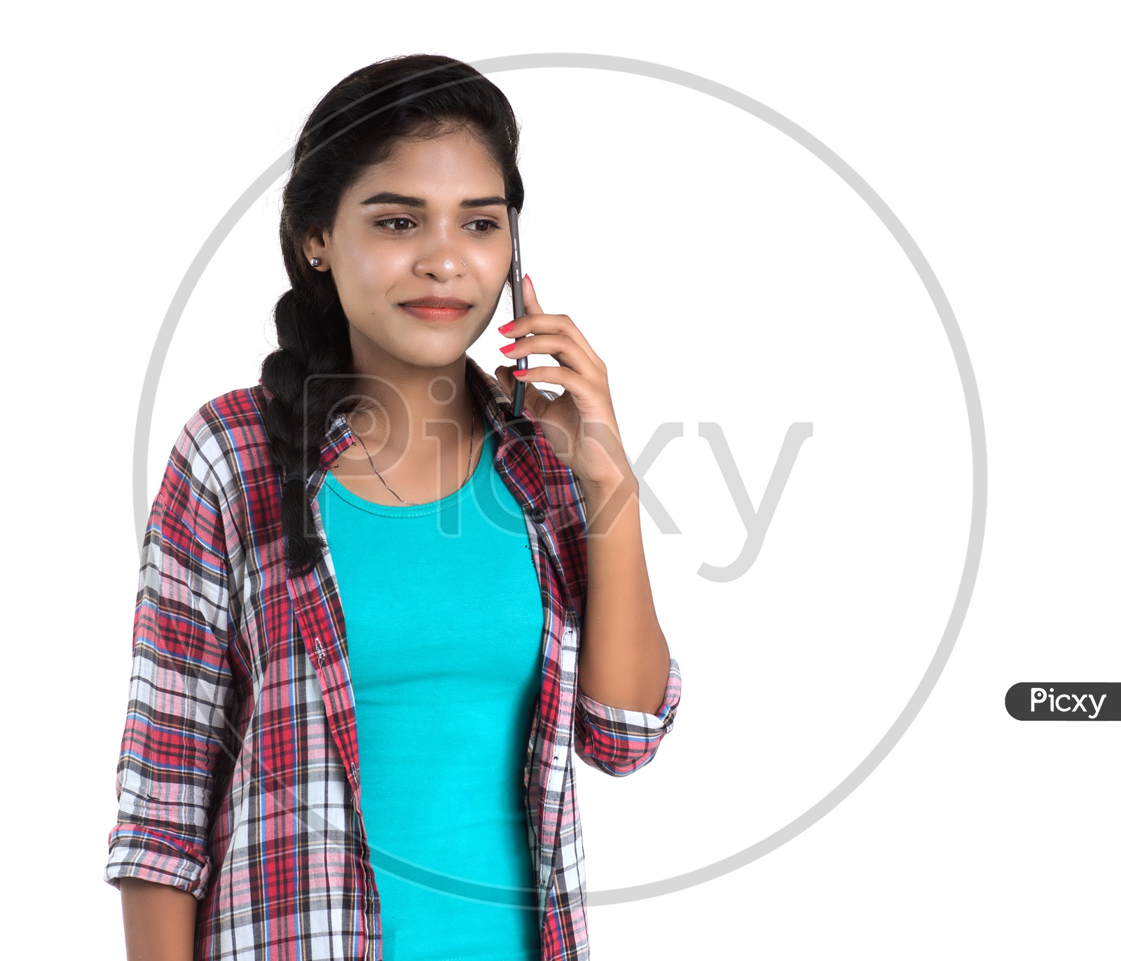 A Happy Young Indian Girl Talking In Smart Phone with a Expression on her  Face on an Isolated White Background