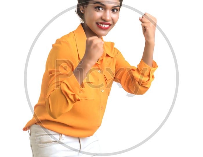 Indian woman wearing orange shirt
