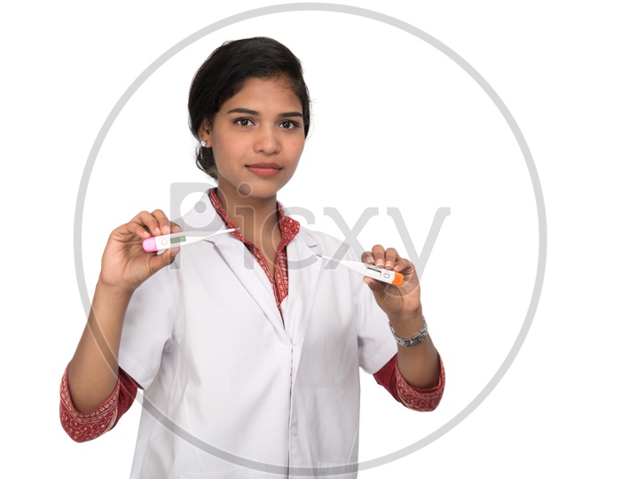 Young Woman Doctor Checking Thermometer on an Isolated White Background