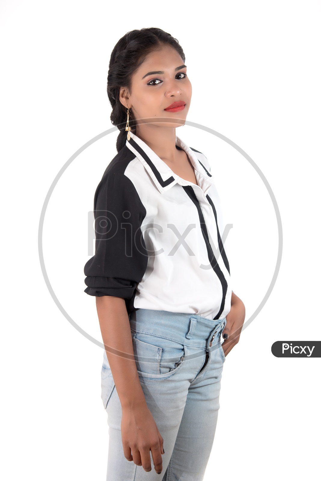 Portrait Of a Young Girl Posing On an Isolated White Background