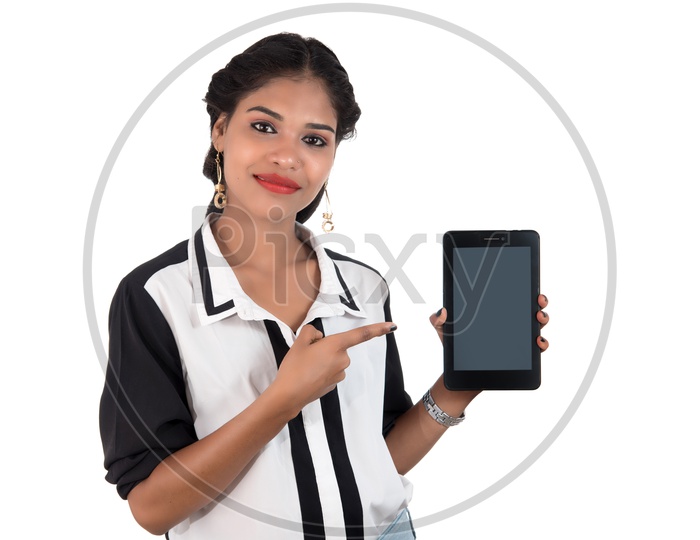 A Young Pretty Girl Showing Smart Phone Blank Screen and Showing Empty Space  on an isolated White Background