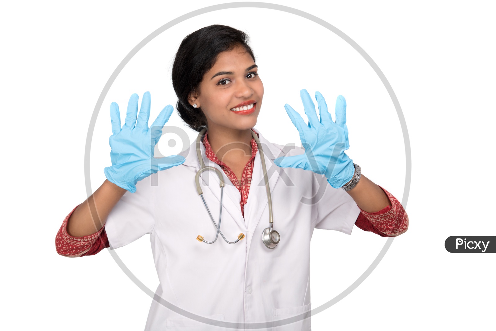 Young Lady Doctor Wearing Surgical Gloves And Posing On an Isolated White Background