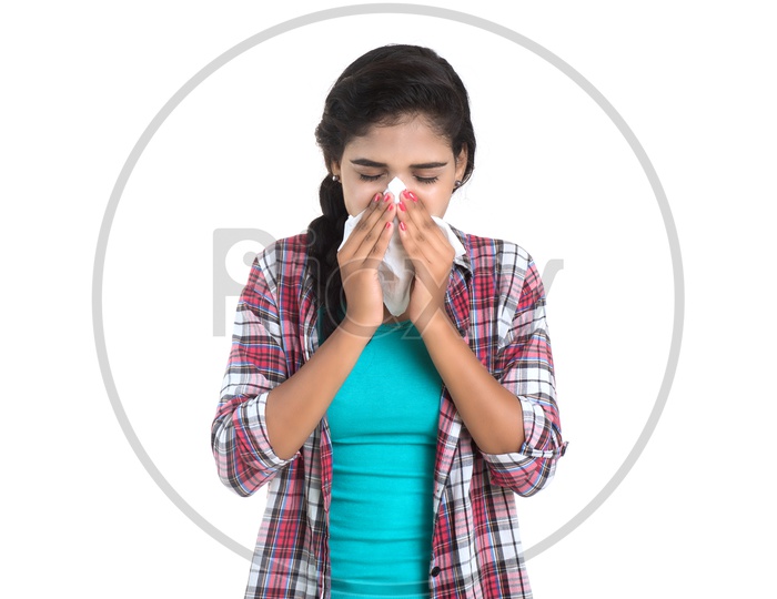 Young Sick Woman Blowing Her Nose to a kerchief , Running Nose , Has Fever , Cold and Allergic Rhinitis . Young Woman Got Cold