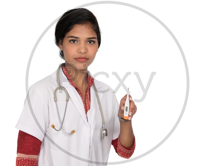 Young Woman Doctor Showing  Thermometer on an Isolated White Background