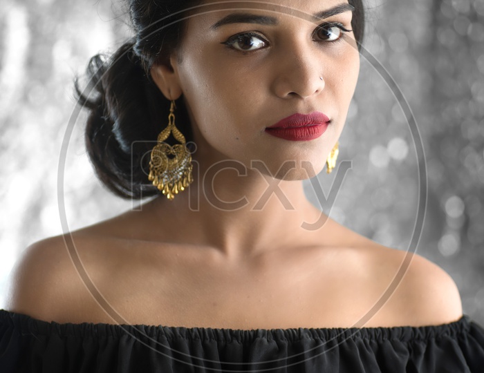 Portrait of a Attractive Young Woman Posing with intense Looking