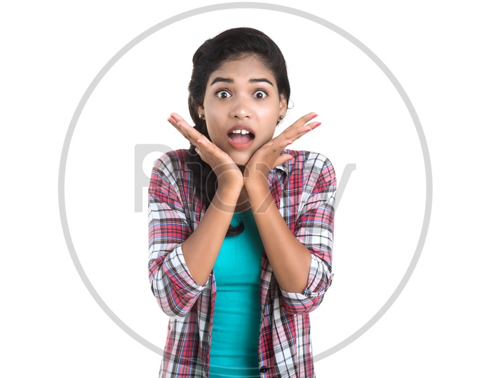 Portrait Of an Young Pretty Indian Girl With an Expression on Her Face On White Background