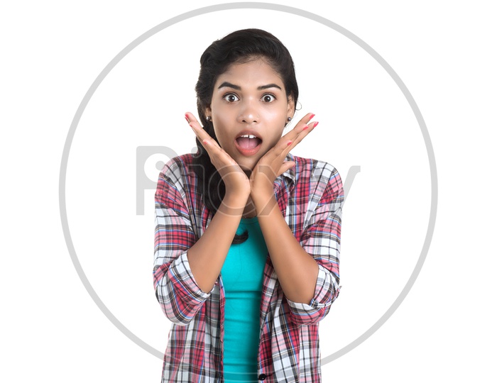 Portrait Of an Young Pretty Indian Girl With an Expression on Her Face On White Background
